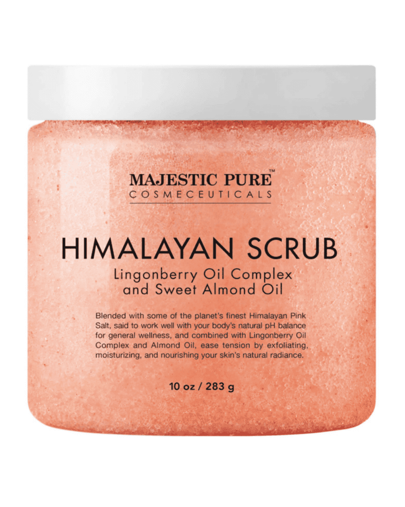 A jar of Majestic Pure Himalayan Scrub, a beauty essential featuring Lingonberry Oil Complex and Sweet Almond Oil. The label highlights its exfoliating and moisturizing properties. The 10 oz (283 g) container boasts a pale pink appearance, perfect for your skincare routine.