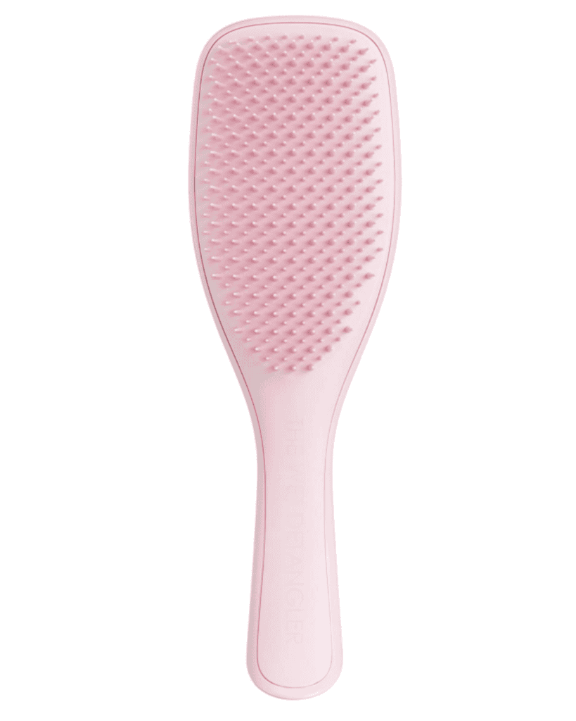 A beauty essential, this pink hairbrush boasts a wide, rectangular paddle with a comfortable handle. Its numerous soft bristles are perfect for detangling hair effortlessly.