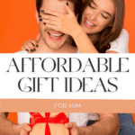 A woman covering a mans eyes to surprise him as he holds a gift wrapped in a red bow with the words across the screen that says Affordable Gift Ideas for Him