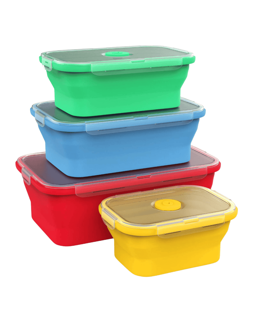 Four eco-friendly plastic containers nest within one another, showcasing vibrant hues of red, yellow, blue, and green. Each container features a transparent lid with a circular seal on top, ensuring freshness and sustainability in every colorful choice.