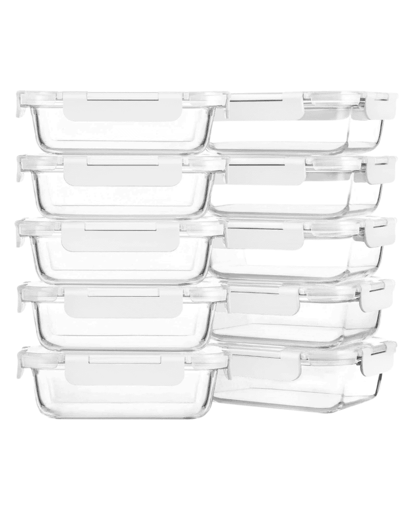 Stack of eight eco-friendly transparent glass food storage containers with white lids, arranged in two columns.