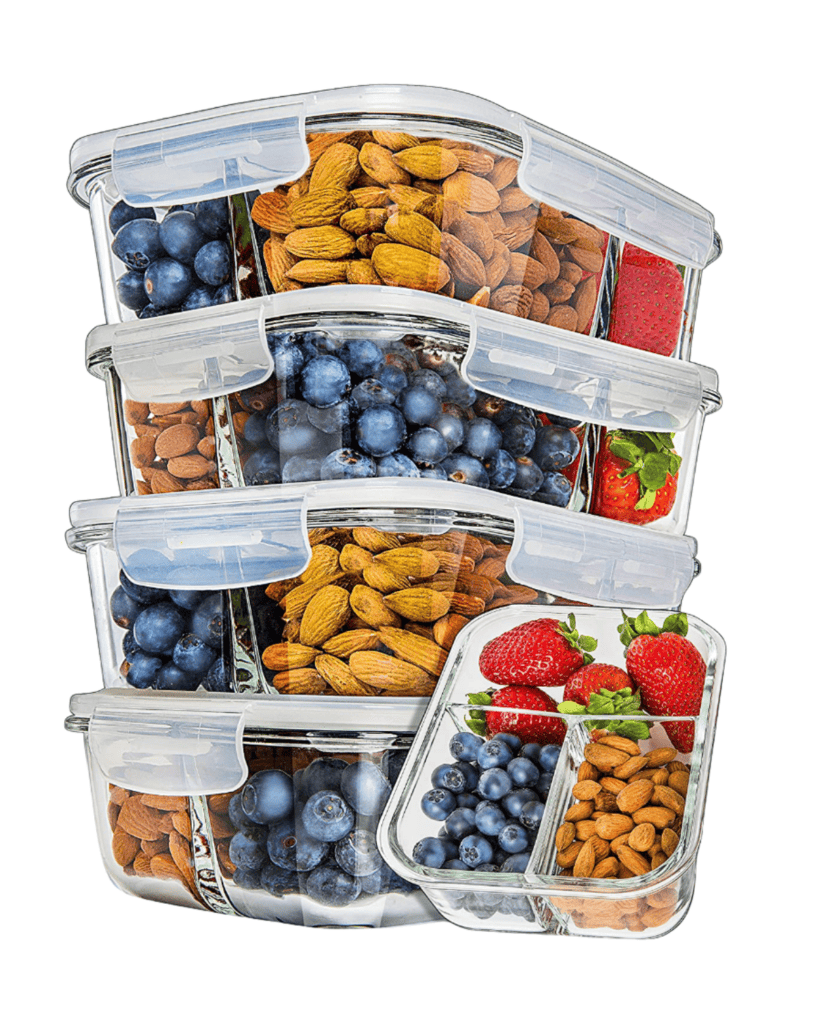 Stacked eco-friendly glass food storage containers with clear lids, each filled with vibrant assortments: compartments of almonds, blueberries, and strawberries. The containers are arranged in a visually appealing, tiered manner.