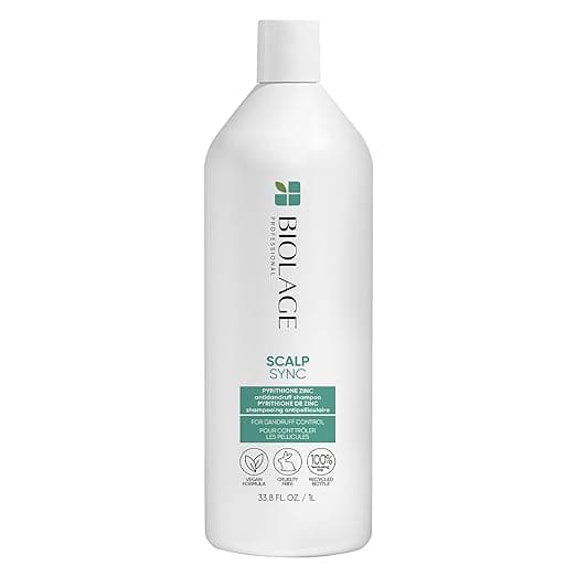 A 33.8 fl oz bottle of Biolage Scalp Sync shampoo is perfect for dandruff control. This white bottle with a green label highlights its vegan and paraben-free formula. Don't miss out on great Monday Deals to snag this essential hair care product!