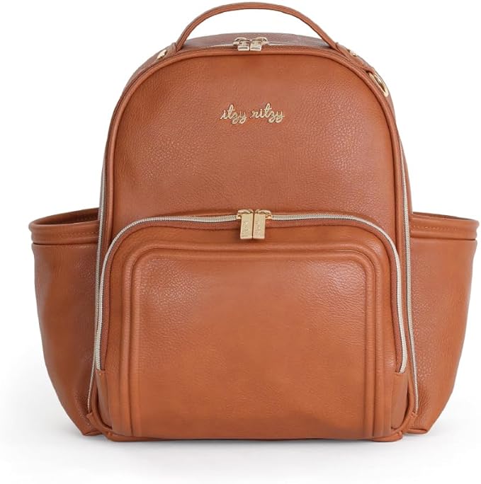 Discover our stylish brown leather backpack, featured in this week's Monday Deals. With a top handle, multiple compartments, two side pockets, and a front zippered pocket, it combines functionality with elegance. The brand name is embossed in gold on the front for a touch of luxury.