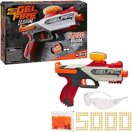 Image of a Nerf Gel Fire Legion blaster with its packaging. Featuring a striking red and gray design, it includes an orange gel round container and safety goggles. Perfect for action enthusiasts, this set comes with 5,000 gel rounds. Don't miss out on Thursday Deals for extra fun!