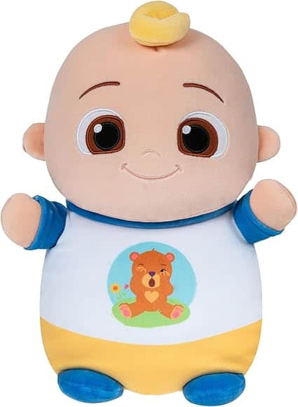 This plush doll, perfect for Tuesday Deals, has a round face, big brown eyes, and a small smile. It sports a tuft of yellow hair and wears a shirt with a bear design. The body is blue and yellow, featuring short arms and legs—a delightful addition to any collection.