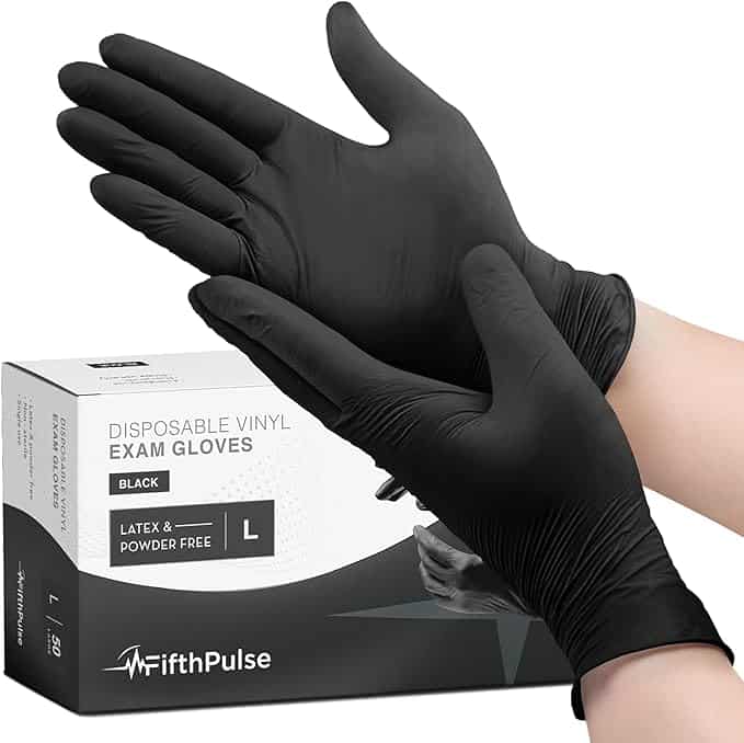 A person wearing a black disposable glove securely fits it onto their other hand. In the background, a box labeled "FifthPulse Disposable Vinyl Exam Gloves, Black, Latex & Powder Free, L" indicates its origin from Monday Deals.