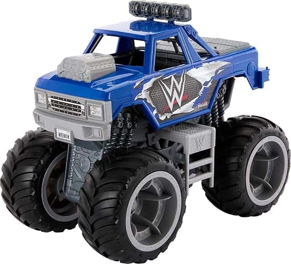 A toy monster truck with large black wheels and a blue body featuring a WWE logo. The truck boasts a rugged design with silver details and a decorative engine on the hood, ready to roar into action. Grab it during our Wednesday Deals for unbeatable excitement!