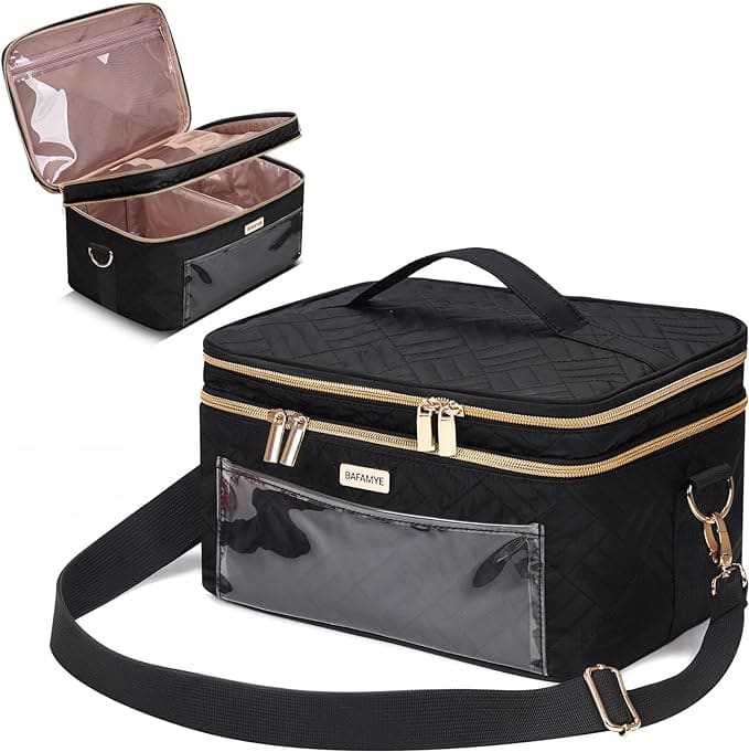 A black quilted makeup bag with gold zippers and a transparent front pocket, perfect for snagging during those Monday Deals. It features a detachable shoulder strap, a top handle, and a pink-lined interior with compartments for organizing your essentials.