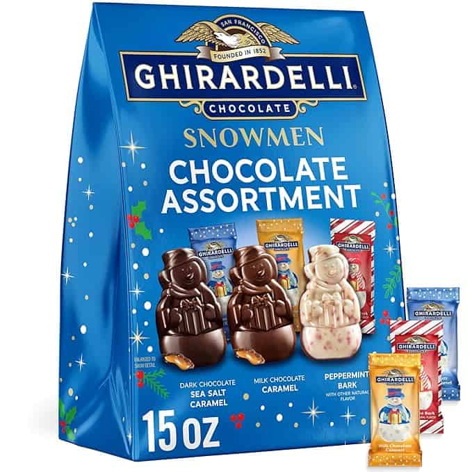 A blue package of Ghirardelli Snowmen Chocolate Assortment offers a sweet touch to any Monday Deals shopping spree. It features images of dark chocolate sea salt caramel, milk chocolate caramel, and peppermint bark snowmen. The 15 oz package includes three delightful chocolate types.