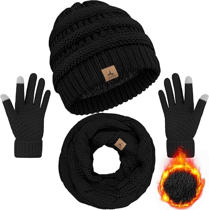 Discover our Tuesday Deals on black winter accessories, featuring a knitted beanie, touchscreen gloves, and a circular scarf. The image evokes warmth with a small flame beside the scarf, perfect for cozy winter days.