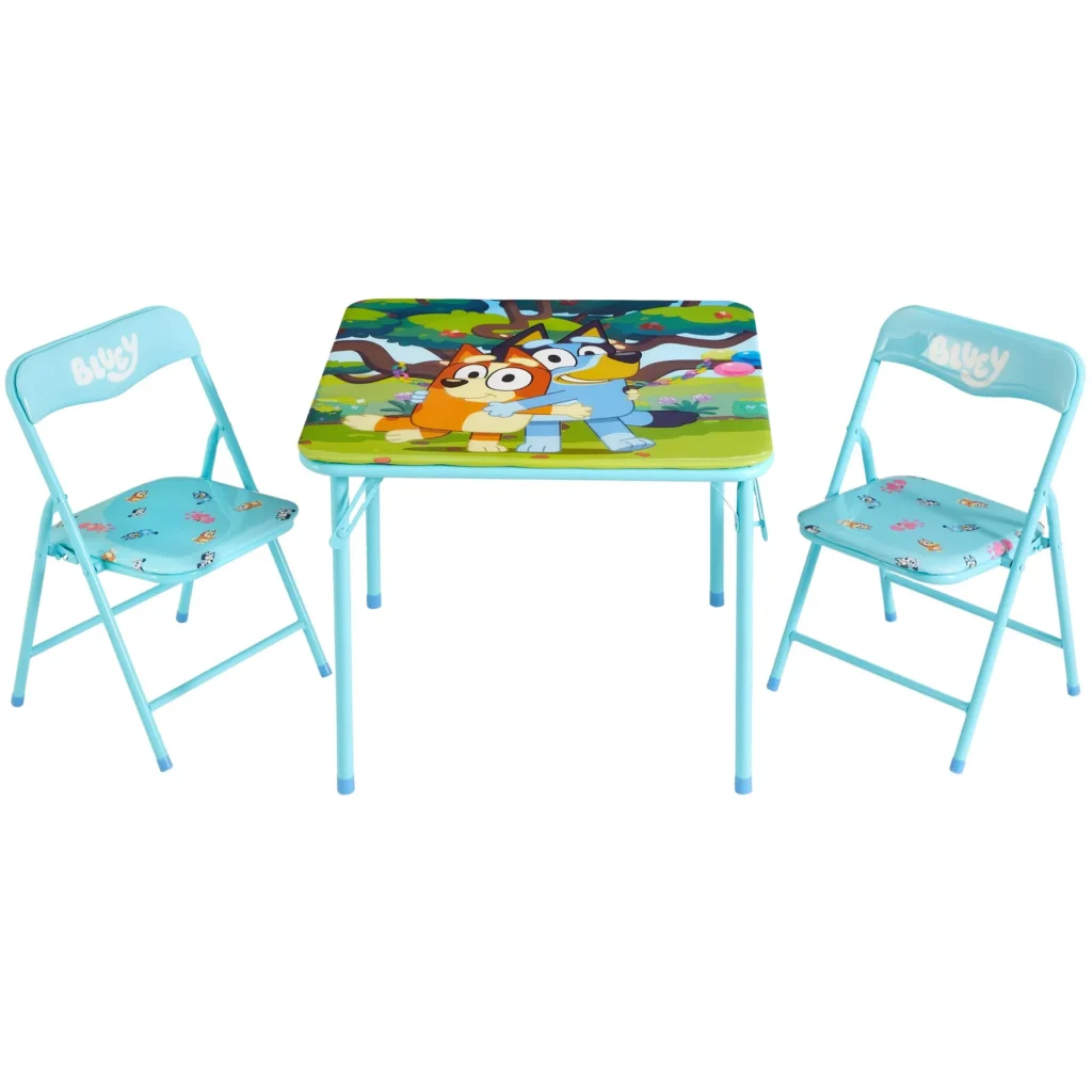 A children's blue table adorned with colorful cartoon characters and two matching foldable chairs is perfect for playtime or crafts. The vibrant design, now part of our special Tuesday Deals, makes it irresistibly appealing to kids.