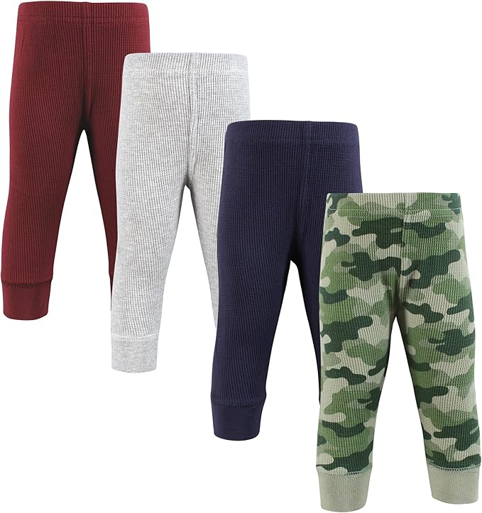 Four pairs of children's ribbed knit pants are displayed for Friday Deals: one burgundy, one gray, one navy blue, and one with a green camouflage pattern. They are arranged in a line from left to right.