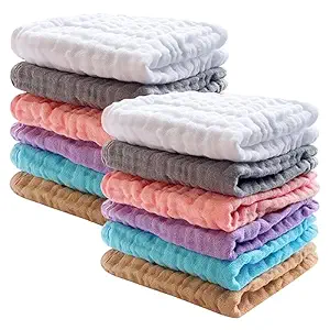 A stack of colorful muslin washcloths, perfect for your Monday Deals find, is arranged in two neat piles. The washcloths boast a spectrum of colors including white, pink, gray, purple, blue, and beige. Each cloth showcases a textured, crinkled appearance that adds charm to their practicality.