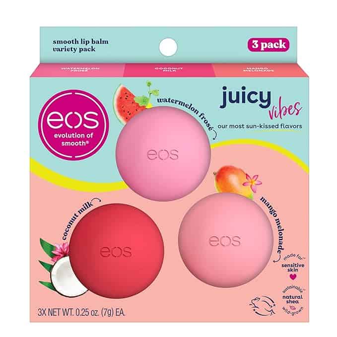 A package of EOS lip balm featuring three flavors: Coconut Milk, Watermelon Frosé, and Mango Melonade. The round containers in pink, red, and light pink highlight their natural shea and nourishing benefits. Perfect for grabbing during Tuesday Deals!.