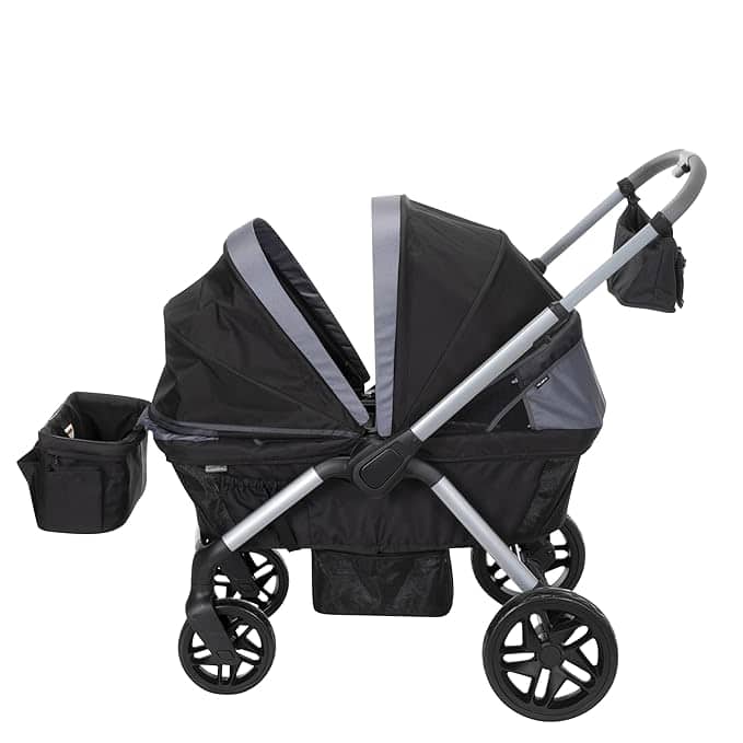 Side view of a sleek black double stroller, perfect for Wednesday Deals. It features two seats with large canopies, a sturdy metal frame, and multiple storage compartments, including cup holders and an ample basket underneath.