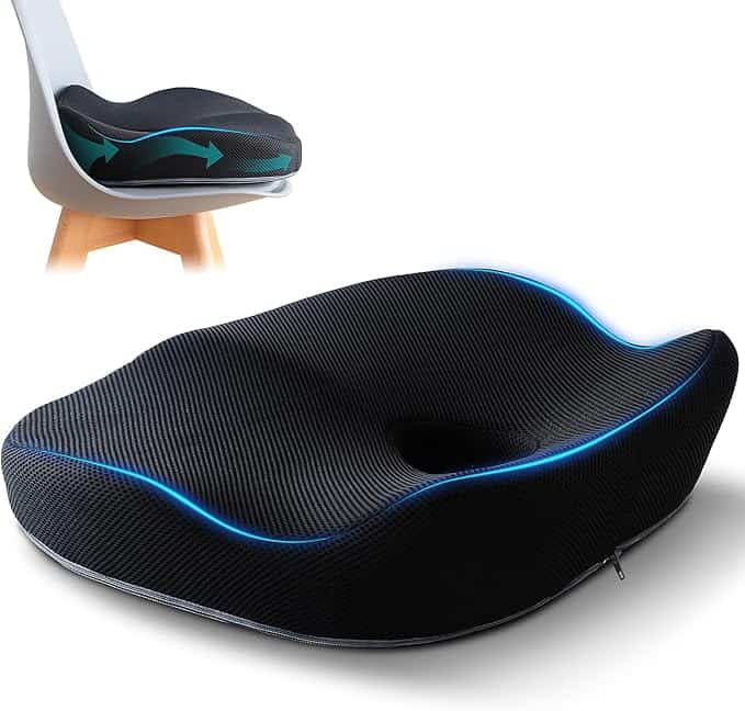 A black ergonomic seat cushion with a contoured design is shown on a chair, featuring blue accents and arrows indicating airflow or pressure points. Perfect for comfort and support, this cushion is an ideal find among Friday Deals.