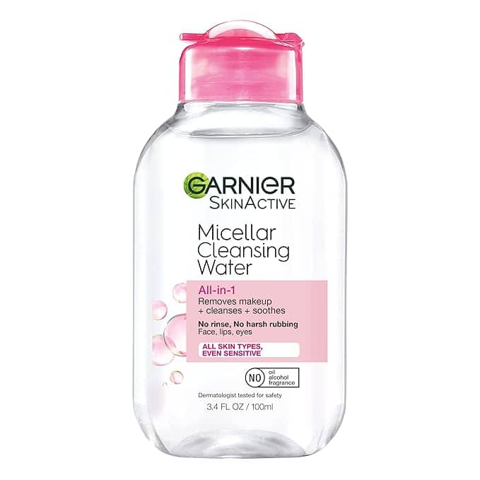 A clear bottle of Garnier SkinActive Micellar Cleansing Water with a pink cap features on our Wednesday Deals. The label highlights "All-in-1" benefits, removing makeup and cleansing. Suitable for all skin types, even sensitive skin. 34 fl oz (100 ml).