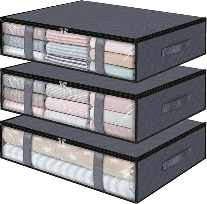 Three gray fabric storage boxes with transparent fronts are stacked, each showcasing neatly folded clothes in assorted pastel colors. Handles on the sides allow for easy carrying. Don't miss out on Thursday Deals to organize your space with style and convenience!.