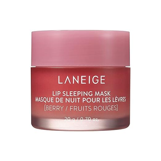 A pink container of Laneige Lip Sleeping Mask in Berry flavor, perfect for your Monday Deals haul. The jar features white text with product details in English and French and contains 20g or 0.70 oz of luxurious lip mask.