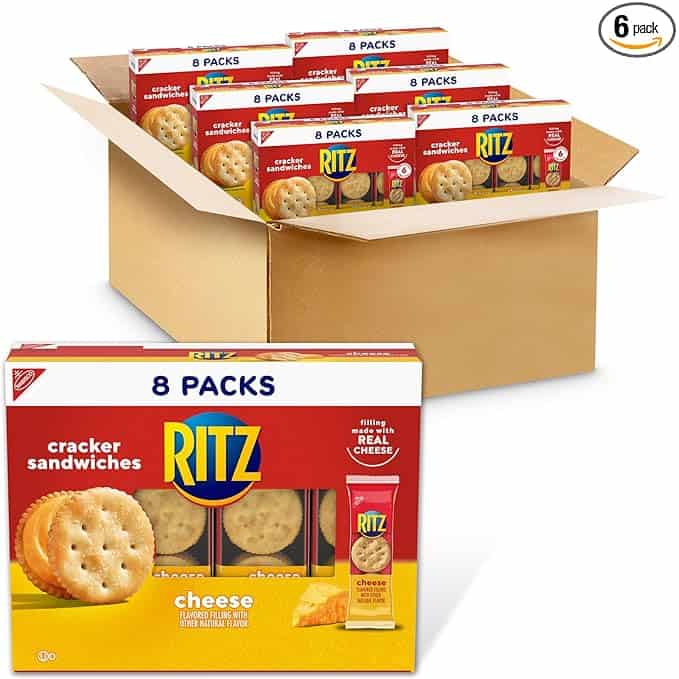 A box featuring multiple packs of Ritz cracker sandwiches, each boasting the "8 PACKS" label and delicious cheese flavor, is proudly displayed. One pack stands in front for detail, offering a perfect taste for your Friday Deals.