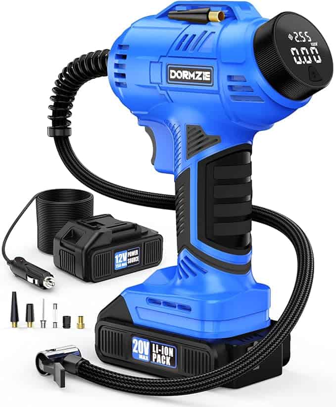 Discover our Tuesday Deals on this blue cordless tire inflator, featuring a digital display at 2.5 bar. It includes a 20V lithium-ion battery pack, power source adaptor, and various nozzle attachments. The inflator boasts a coiled air hose and handle with black grips for easy use.