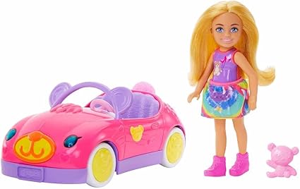 A blonde doll in a colorful dress stands next to a pink toy car, adorned with bear-themed designs and a small pink teddy bear. The car boasts purple accents and yellow wheels. Sporting pink boots, this charming set is perfect for those irresistible Thursday Deals.