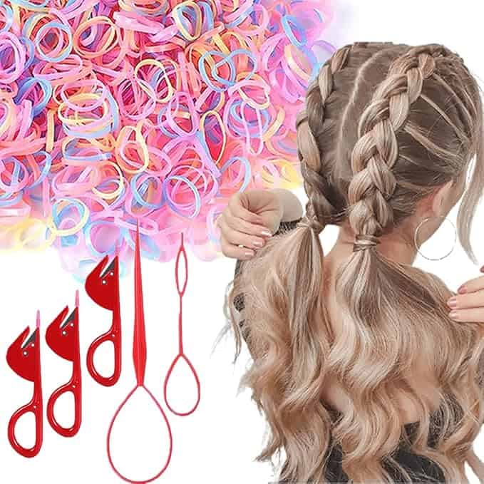 A woman with braided hair holds two pigtails, surrounded by colorful hair elastics and red styling tools, including loop tools and hair cutters. Take advantage of Wednesday Deals to stock up on your favorite styling essentials, all set against a pristine white background.