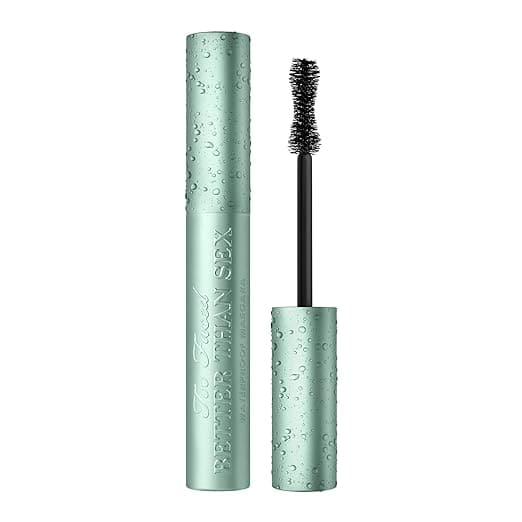 A tube of Too Faced Better Than Sex Waterproof Mascara in an aqua color with water droplets on the surface, perfect for snapping up during Friday Deals. The cap is slightly unscrewed, revealing a black, hourglass-shaped brush wand.