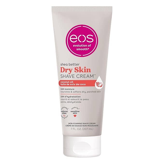 A tube of eos Dry Skin Shave Cream in beige features a pink circle logo at the top. Highlighting coconut oil for soothing dry skin, it offers 24-hour moisture. Sized at 7 fl. oz (207 ml), this cream is perfect for Friday Deals to keep your skin smooth and hydrated all weekend long.