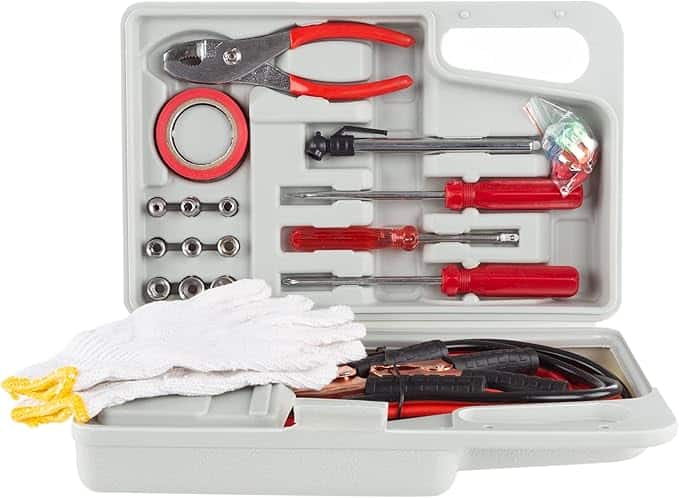 A grey tool kit, perfect for Tuesday Deals, features a handle and includes pliers, a set of wrenches, a roll of red tape, screwdrivers, a small LED light, jumper cables, and white gloves with yellow trim.