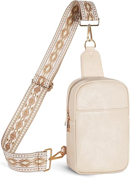 Discover this beige crossbody bag, perfect for Thursday Deals. It boasts a zippered main compartment and an adjustable strap with a geometric pattern in brown and cream. Gold-tone hardware elegantly accents both the bag and strap attachments, offering style and practicality in one chic design.