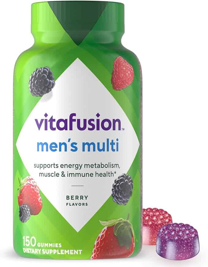 A green bottle of Vitafusion Men's Multi berry-flavored gummies is spotlighted for Monday Deals, featuring a white diamond label with vibrant fruit images. Boasting support for energy, metabolism, muscle, and immune health, two gummies are temptingly placed outside the bottle.