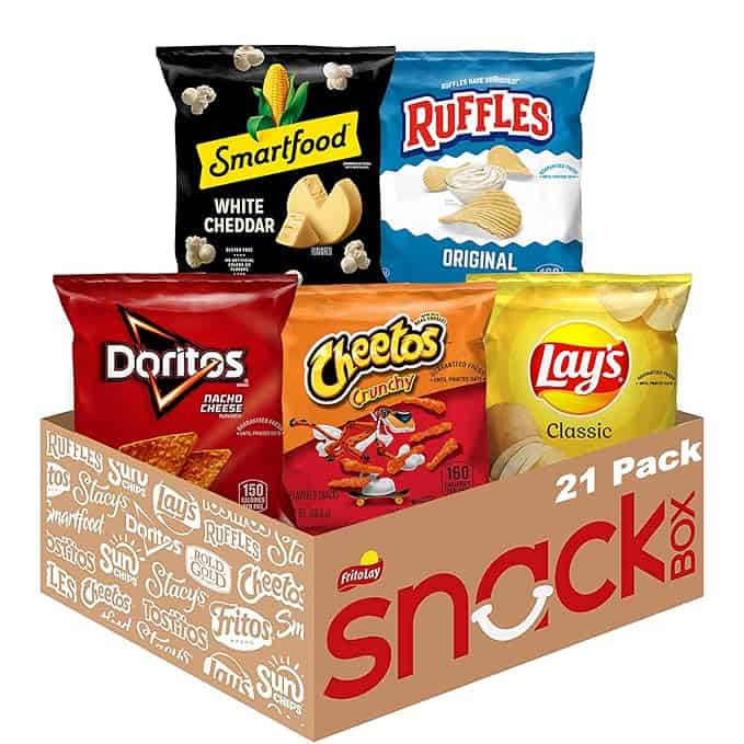 A box labeled "21 Pack" offers an assortment of snack bags: Smartfood White Cheddar popcorn, Ruffles Original chips, Doritos Nacho Cheese chips, Cheetos Crunchy snacks, and Lay’s Classic chips. Perfect for Wednesday Deals!.