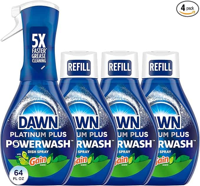 Four bottles of Dawn Platinum Plus Powerwash Dish Spray, perfect for your Monday Deals, are shown. The image features one spray bottle and three refill bottles with Gain scent branding. The label highlights "5X faster grease cleaning" and a total size of "64 FL OZ.