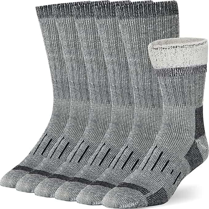 A set of six gray and black ribbed crew socks, each with black accents at the toe and heel, perfect for Thursday Deals. One sock is turned down to reveal the plush, cushioned interior. The socks are neatly arranged standing upright.