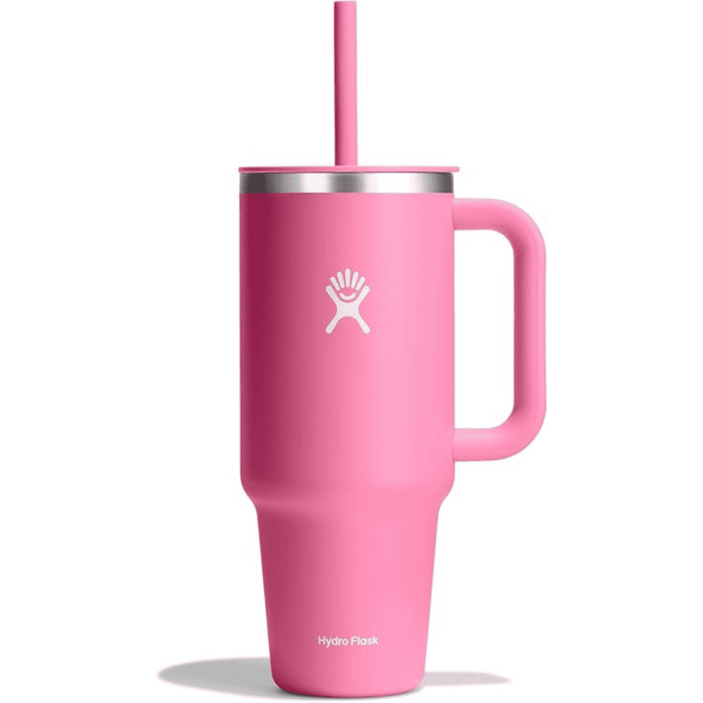 A pink Hydro Flask tumbler with a handle, boasting a matching pink straw and stainless steel rim. The brand's logo and name are visible on the body of the tumbler—perfect for sipping your favorite drink during Tuesday Deals.