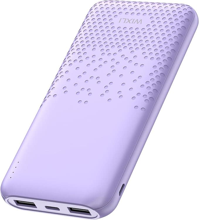 Introducing the WIXI lavender portable power bank, perfect for Thursday Deals. Featuring a textured, perforated design, it offers two USB ports, a USB-C port, and four LED indicator lights at the base. Compact yet powerful, it keeps your devices charged on-the-go.