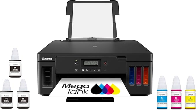 The Black Canon MegaTank printer, spotlighted in our Friday Deals, boasts an open scanner lid, front LCD screen, and visible ink tanks. Six ink bottles—black, cyan, magenta, and yellow—stand ready beside the 'MegaTank' text and colored droplets on a printed page.