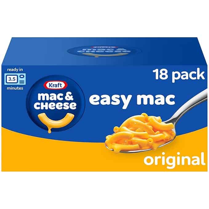 Box of Kraft Mac & Cheese Easy Mac, original flavor, featuring a spoonful of creamy macaroni. Packaging highlights it's an 18-pack and can be prepared in just 3.5 minutes. Predominantly blue and yellow design, perfect for quick meals or stocking up during Wednesday Deals.