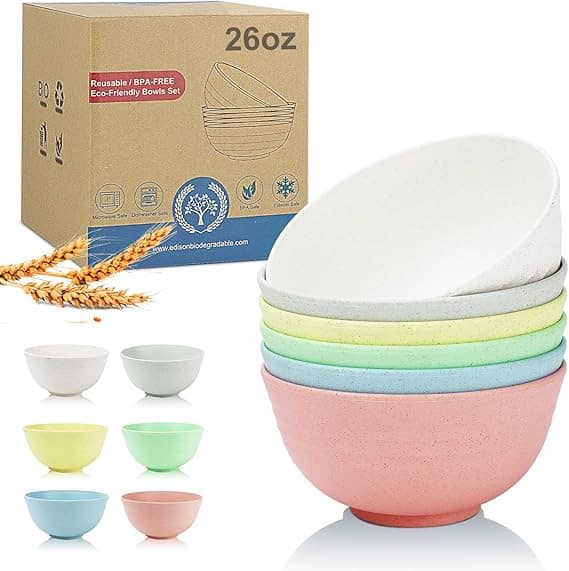 A set of six eco-friendly bowls in various pastel colors is displayed, accompanied by a cardboard box labeled "26oz, Reusable/BPA-Free, Eco-Friendly Bowls Set." Wheat stems sit beside the box. Discover this delightful set as part of our special Thursday Deals!.