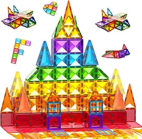 A colorful structure crafted from translucent magnetic tiles, featuring triangular and square shapes, forms a castle. Around it, small shapes create a heart, airplane, and letter "F." Perfect for imaginative play or Tuesday Deals shopping sprees.