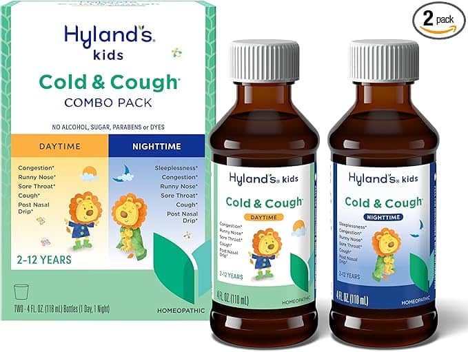 The image showcases Hyland's Kids Cold & Cough Combo Pack, a Monday Deals highlight. It includes Daytime and Nighttime bottles for ages 2-12 years. The box, adorned with a lion illustration, addresses symptoms like runny nose and cough.