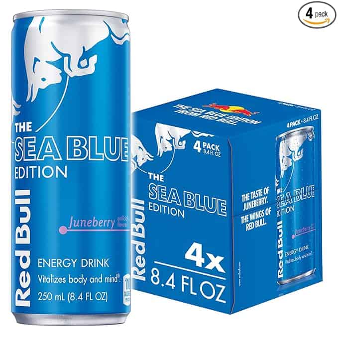 Blue can and box of Red Bull Sea Blue Edition energy drink with Juneberry flavor. The can and box display "Vitalizes body and mind" and "4 pack, 8.4 fl oz." Don't miss out on our exclusive Friday Deals for the ultimate boost!.