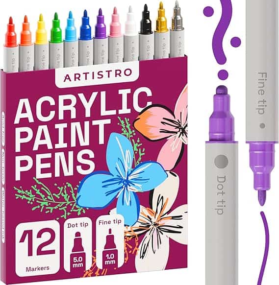 A box of 12 Artistro acrylic paint pens is shown, featuring colorful markers in various shades. The packaging displays vibrant floral designs. Two pens, one with a dot tip and one with a fine tip, are highlighted on the right side—perfect for snagging during Wednesday Deals!.