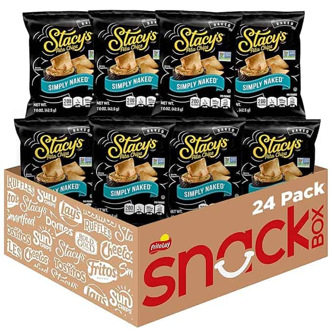 A 24-pack box of Stacy's Pita Chips in "Simply Naked" flavor with sleek black packaging is showcased. Perfect for Tuesday Deals, the box highlights snack icons like Lay's and Cheetos, elegantly set against a warm brown background.