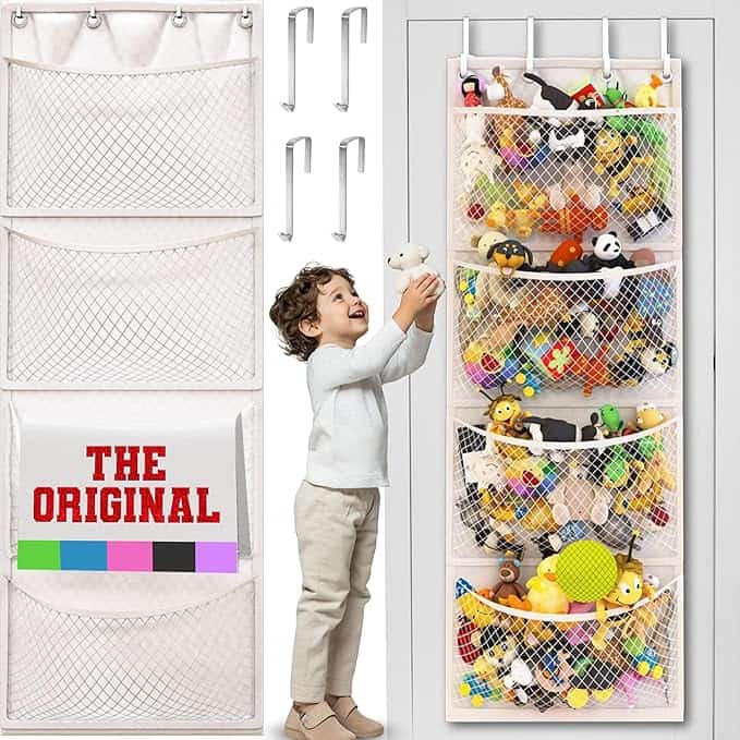 A child reaches for a toy from a white mesh over-door organizer filled with colorful treasures. Four mesh pockets hang on the door alongside handy hooks, perfect for any playroom. Don't miss out—grab yours during our Wednesday Deals and discover why it's labeled "The Original.