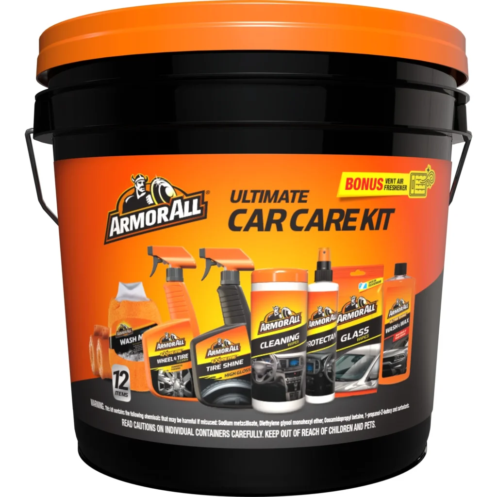 A large black bucket labeled "Armor All Ultimate Car Care Kit" features car cleaning essentials like tire shine, wipes, glass cleaner, and protectant. With a striking orange and black design, it even includes a bonus item. Don't miss the Monday Deals for extra savings!.