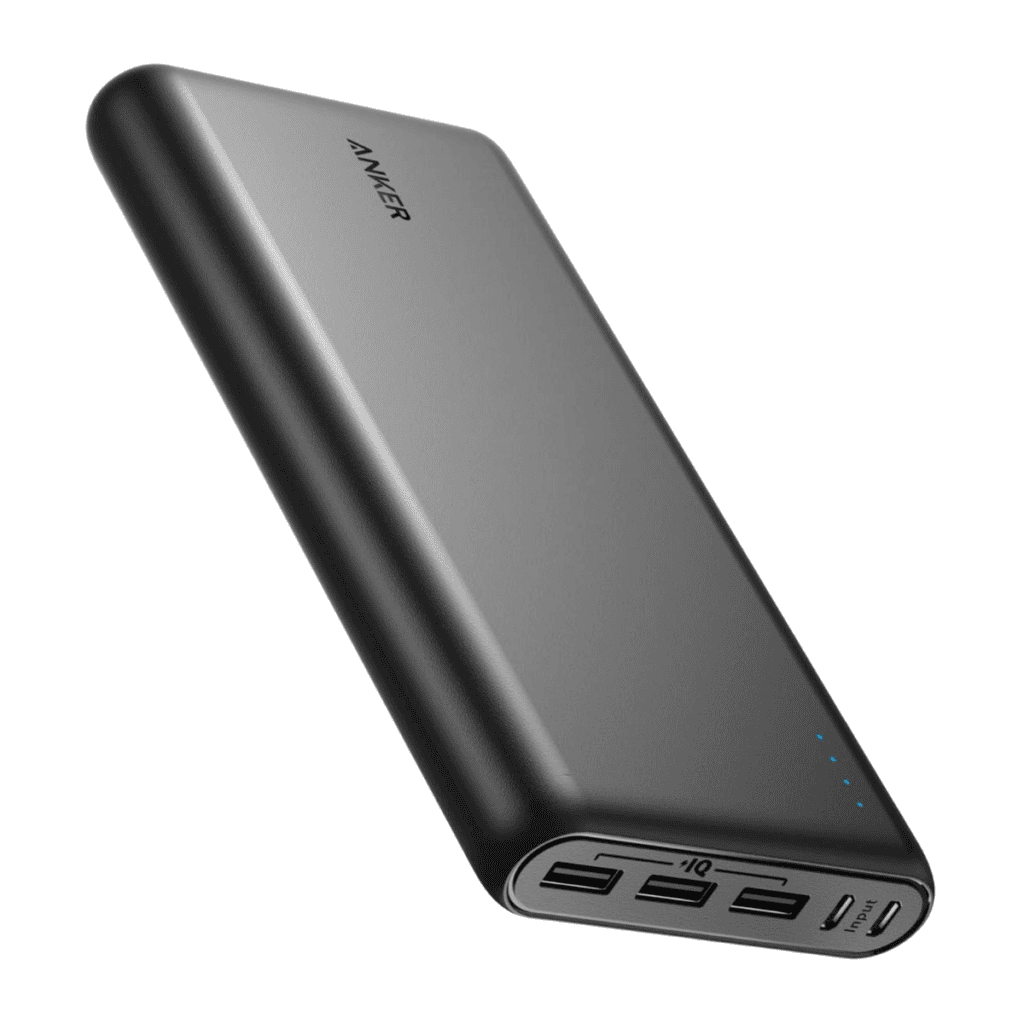 A sleek black Anker power bank, perfect for packing tips experts, featuring four USB ports, a micro USB port, and four LED indicator lights. The Anker logo adorns the upper side as it sits angled against a white background.