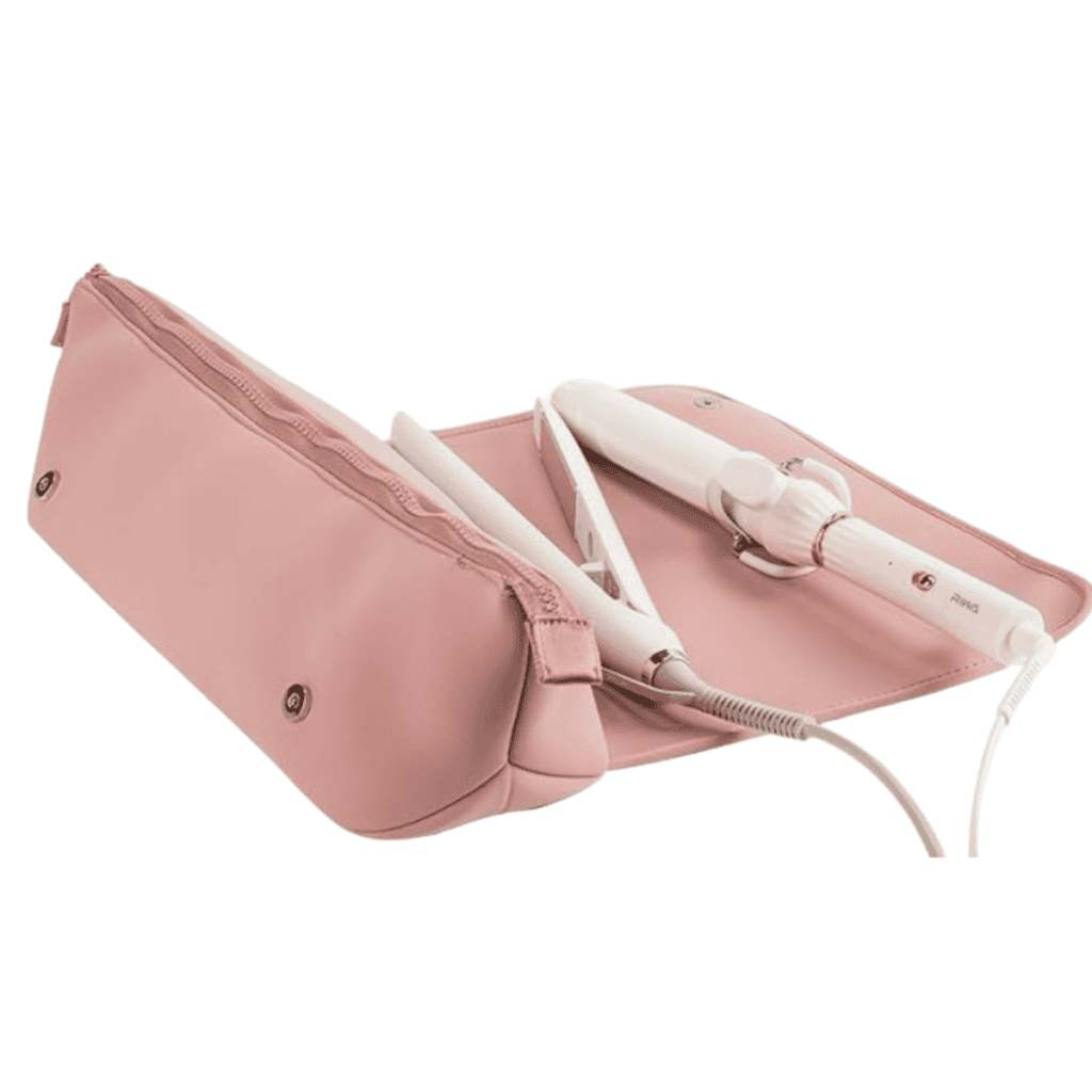 A pink and white hair styling tool set, including a curling iron, comes neatly packed in a matching case. With snap-button closures for easy access, this stylish set is perfect for those who value smart packing tips while ensuring sleek hairstyles on the go.